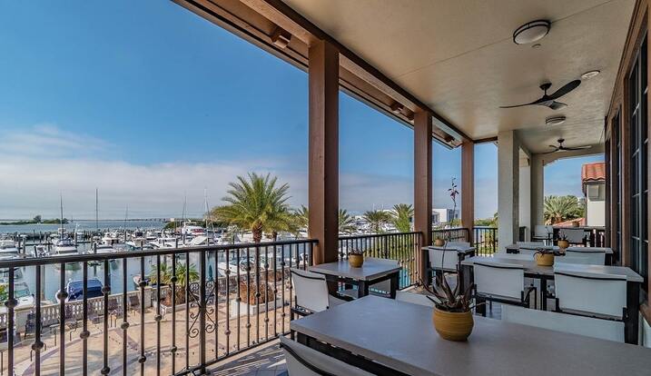 The Bay Club at Westshore Yacht Club with a pool and lounge chairs-Strictly Prohibited-Does not violate relevant federal law