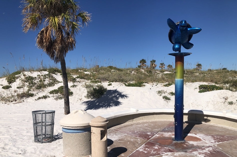 A group of tourists enjoying the nearby attractions and amenities of Clearwater Beachwalk