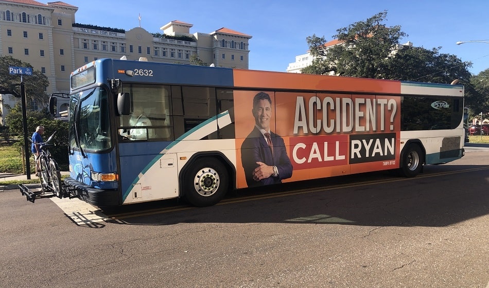 A bus driving on a highway towards Clearwater Beach