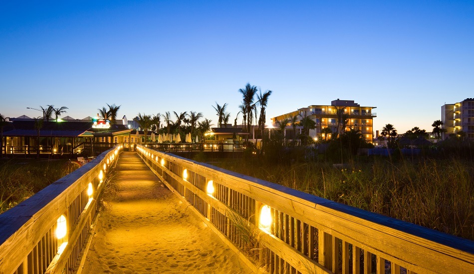 Be half of a couple walking on the beach at St Pete Beach, Florida